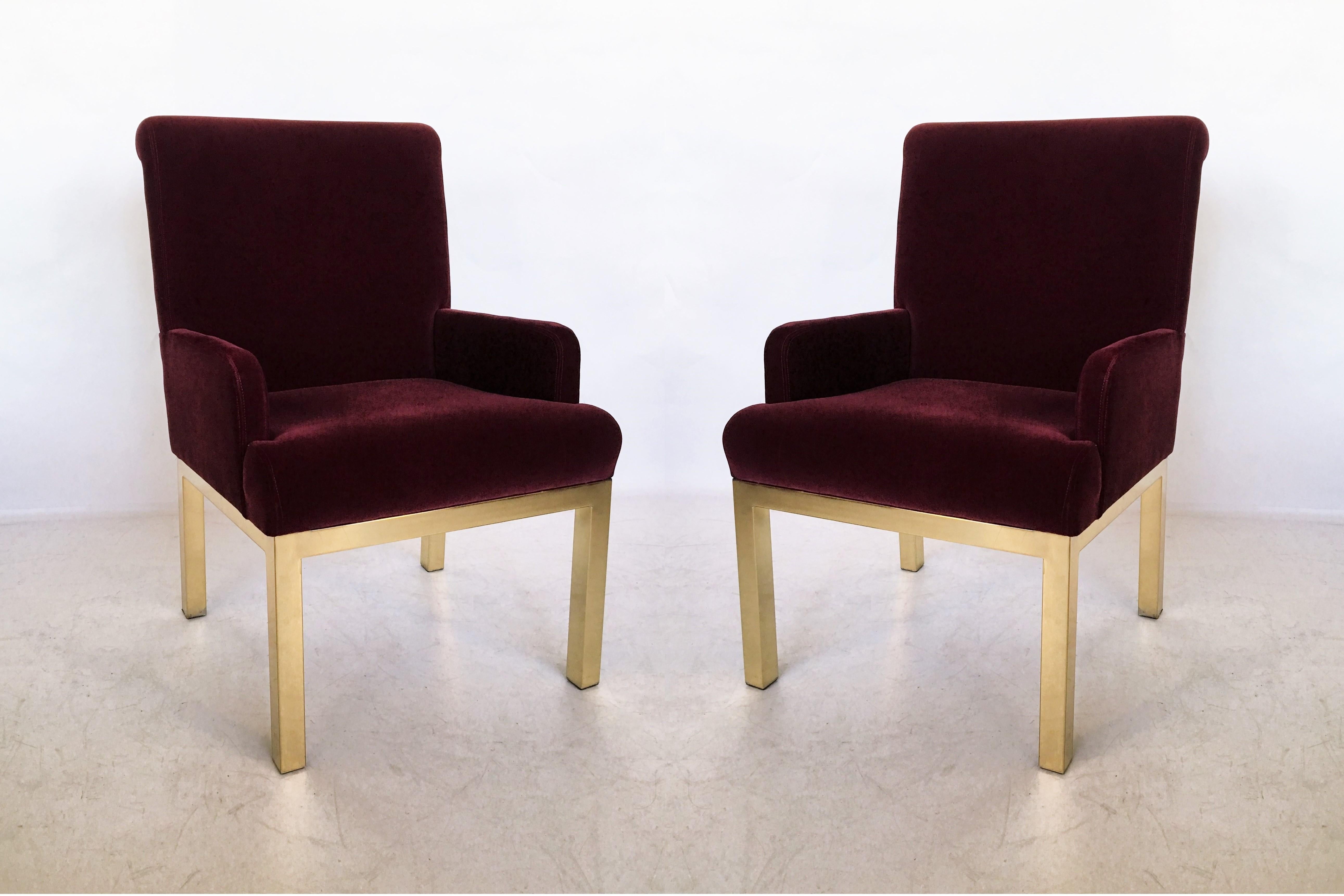 This attractive set of eight Mid-Century Modern brass dining chairs, Design Institute of America, and are a rare design. Ideal for a large dining table. Chairs are upholstered in their original velvet upholstery or you can choose to reupholster the