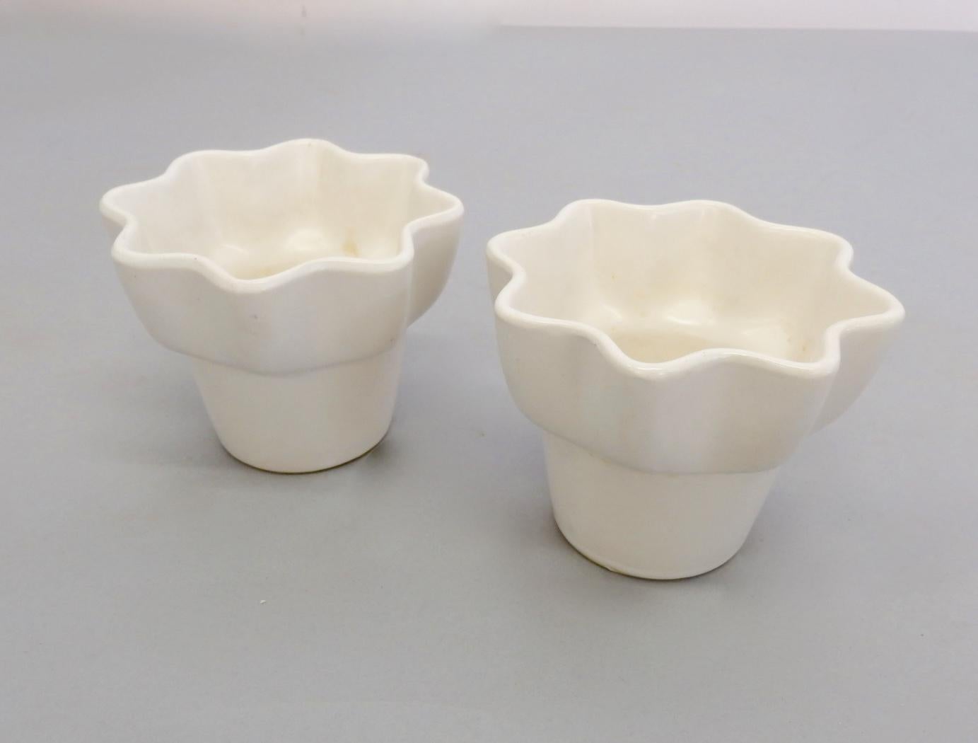 Hard to find set of eight matching mini pots. Marked Imperial F1. Matte whit glaze shows very little wear.