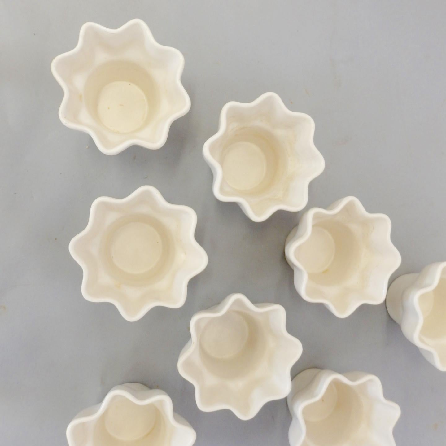 Mid-20th Century Eight Miniature Matte White Imperial Planter Pots