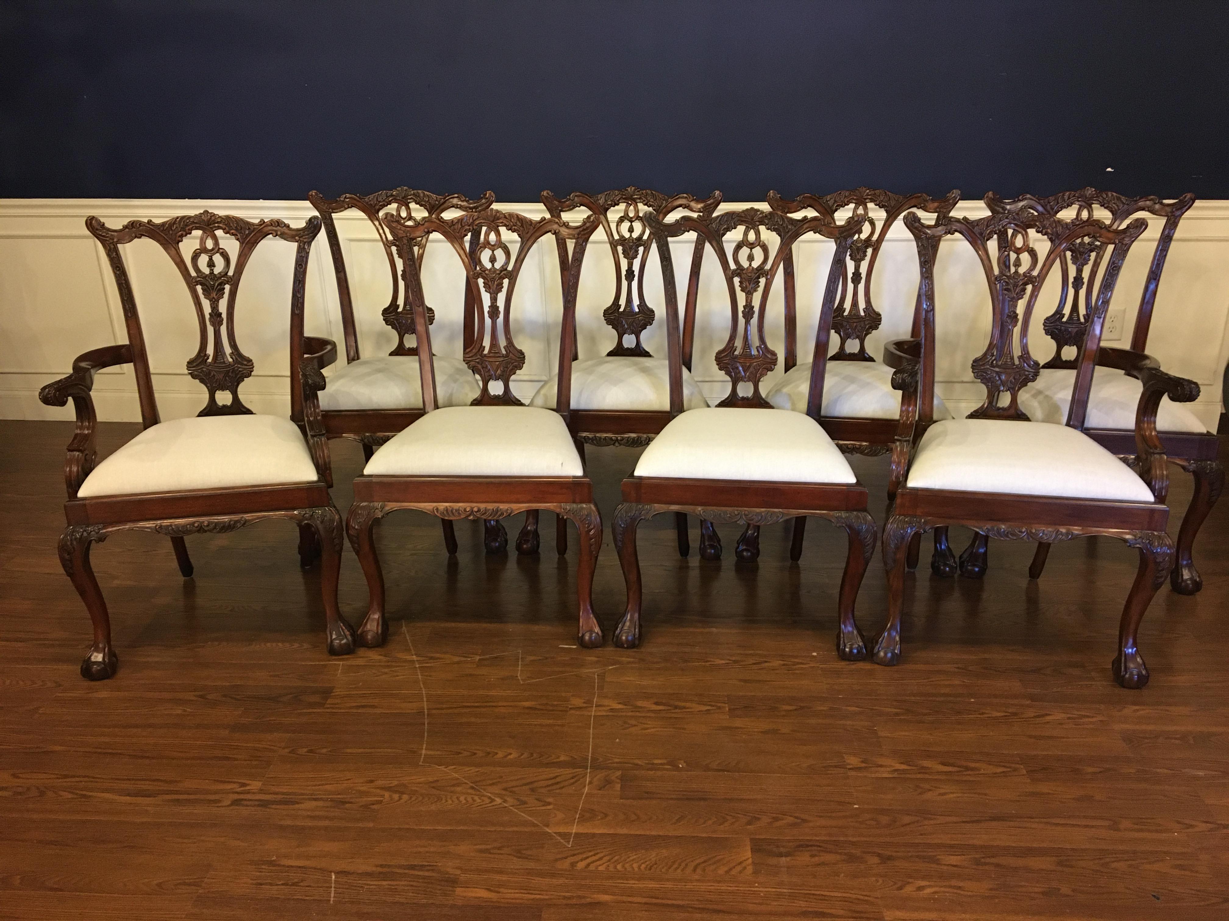 These are new traditional ball and claw Chippendale mahogany dining chairs. Their design was inspired by the English Chippendale dining chairs from the Regency period. They feature Classic Chippendale styling. They have a graceful elegance with
