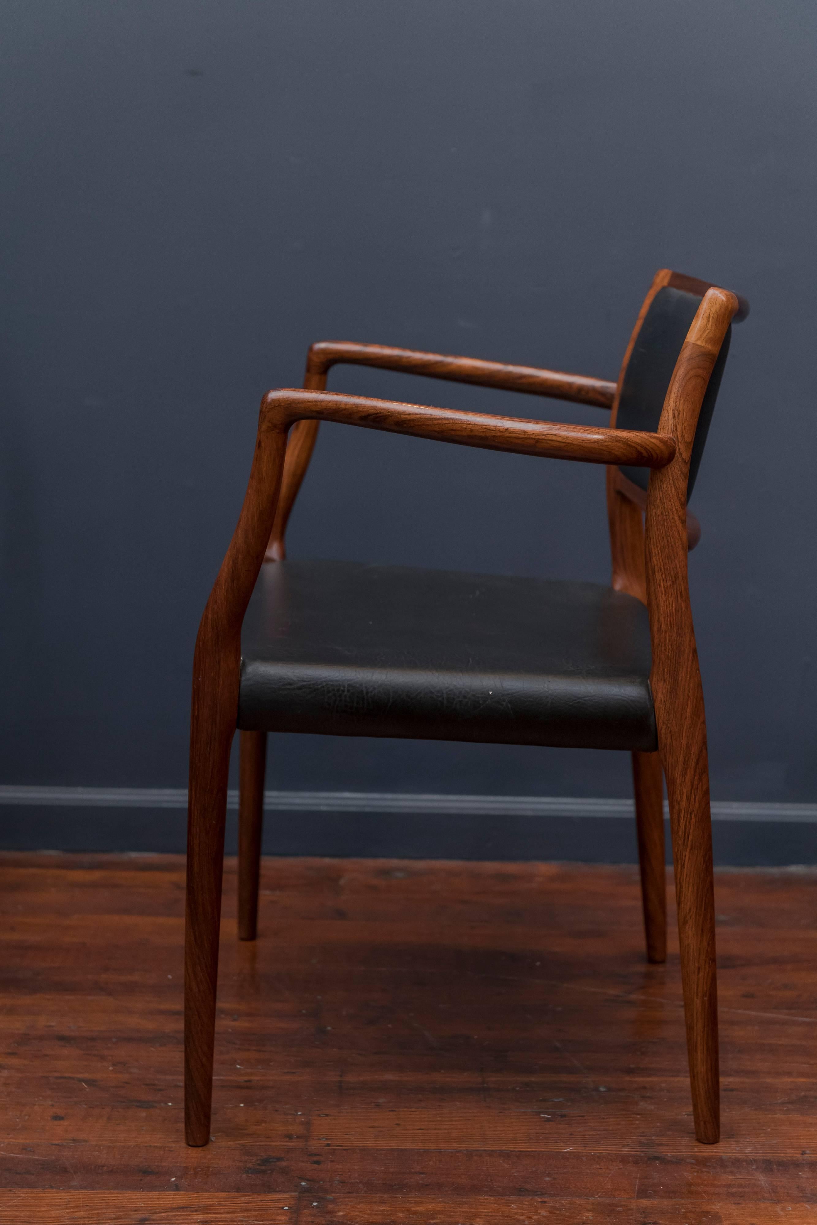 Eight Niels O. Møller Model 80 and 77 Rosewood Dining Chairs 1