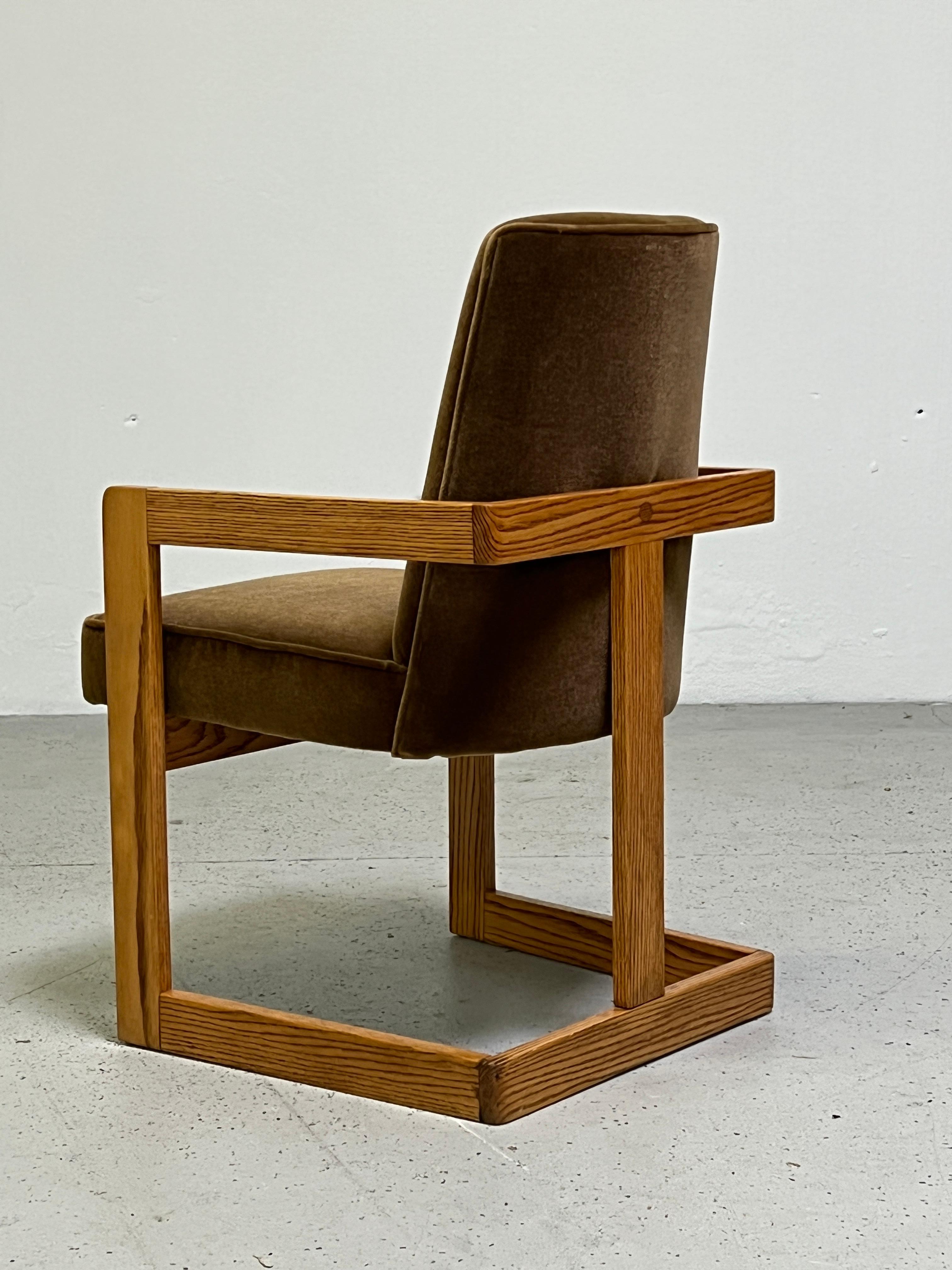 A set of eight oak armchairs with original mohair upholstery. These chairs were acquired with a documented Kagan dining table.