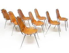 Eight Charlotte Perriand "Les Arcs" Chairs, In Leather And Chromed Steel