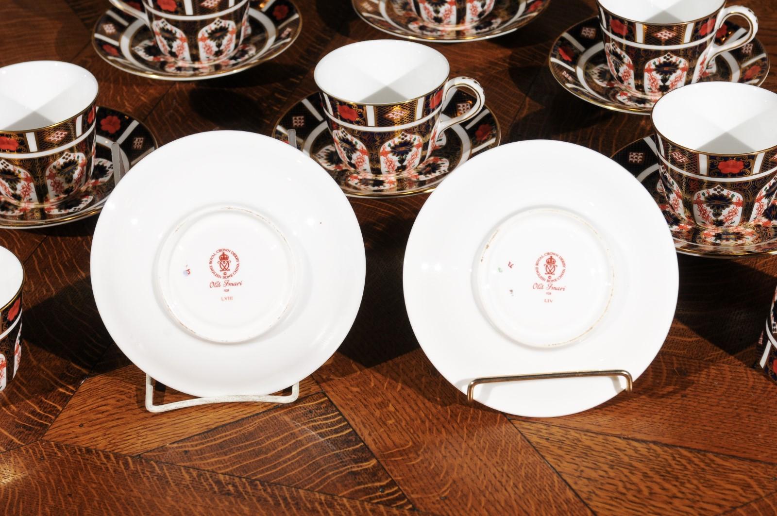 Eight pairs (16 pieces) of English Royal Crown Derby Porcelain Old Imari pattern cups and saucers. Born in England in 1995, each of this set of eight porcelain cups and saucers were produced by the Royal Crown Derby Porcelain Company, famous for its