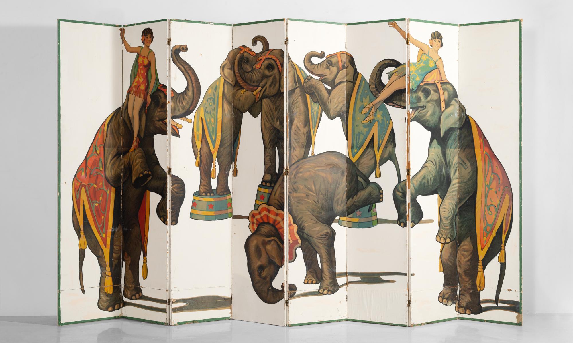 Eight panel printed carnival screen, circa 1940.

Large printed panels reproduce a whimsical, hand-painted scene of elephants and performers. Can be installed on the wall as a painting, or freestanding as a screen.