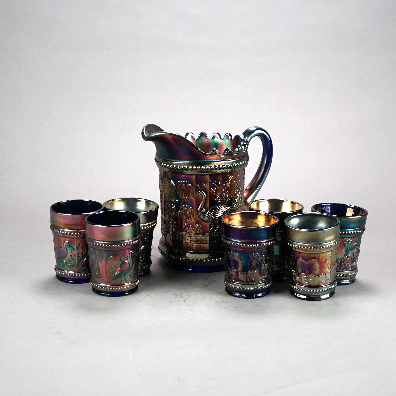 Eight Piece Antique Carnival Glass Beverage Set with Peacock On A Fence Pattern

Pitcher - 8 1/8