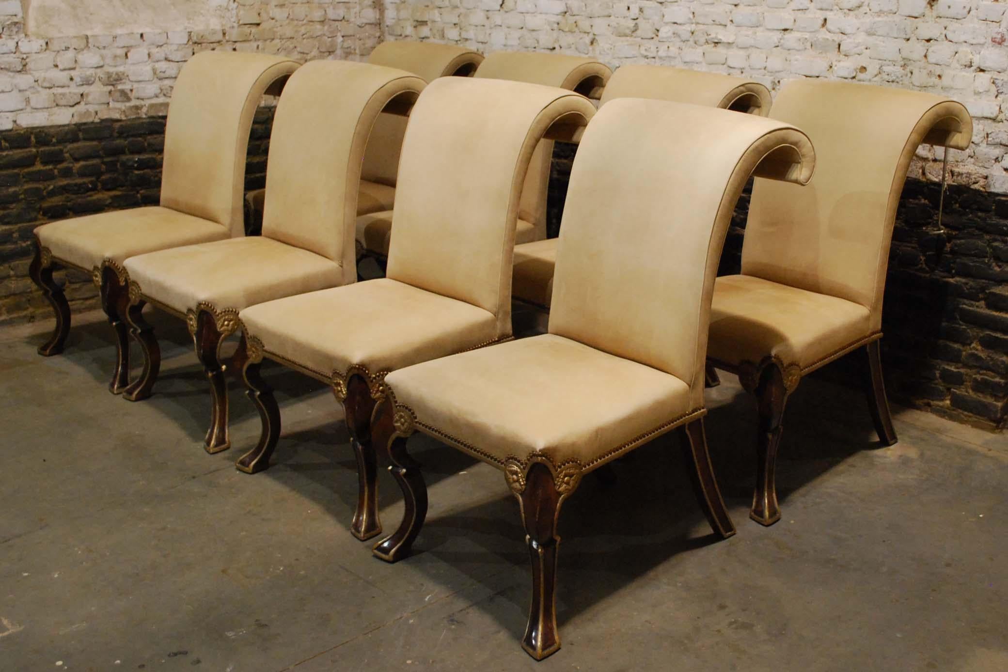 An exclusive and large set of eight handmade Puccini dining chairs by Rose Tarlow Melrose House.
The chairs have a tight seat and back in burgundy painted finish with a 22-karat gold trim. The burgundy paint finish is medium distressed. This was