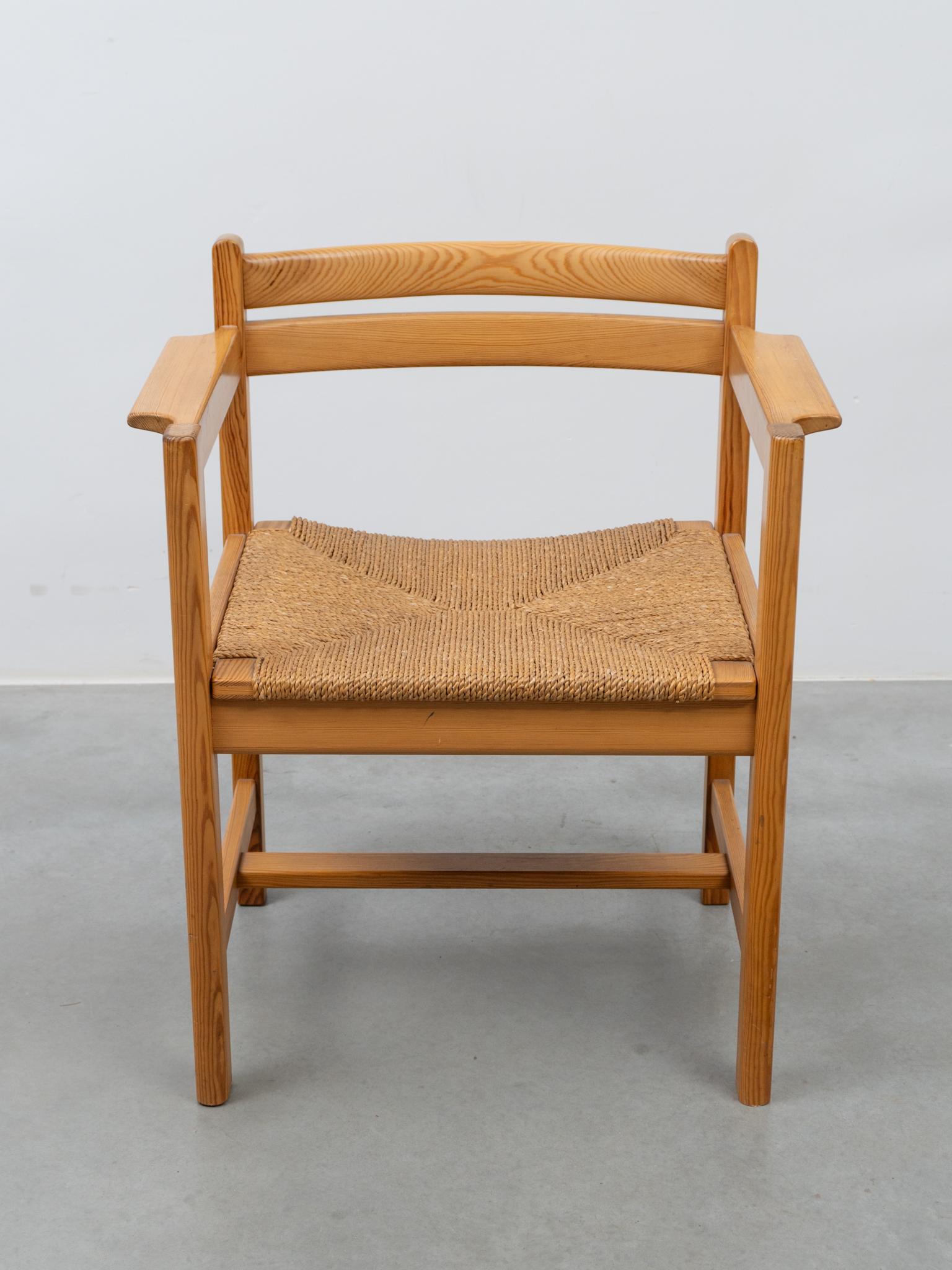 Eight pine and papercord ’Asserbo’ armchairs by Børge Mogensen for AB Karl Andersson & Söner, Sweden. The paper cord seat is original. Børge Mogensen designed his furniture with the idea that it should stand the test of time. These chairs are in a