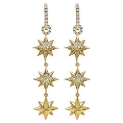 Eight-Pointed Star 14k gold and diamond dangle earring 