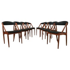 Huit chaises de salle à manger personnalisables Kai Kristiansen en teck restaurées