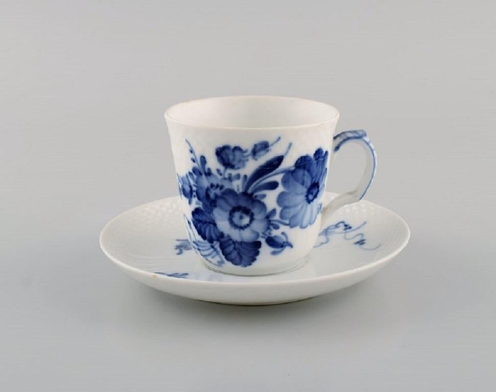 Eight Royal Copenhagen Blue flower Curved espresso cups with saucers. 
Model number 10/1546.
The cup measures: 6.5 x 6 cm.
Saucer diameter: 11.8
In excellent condition.
Stamped.
2nd factory quality.