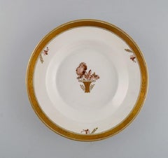Acht Royal Copenhagen Goldene Korb-Deckenteller aus handbemaltem Porzellan