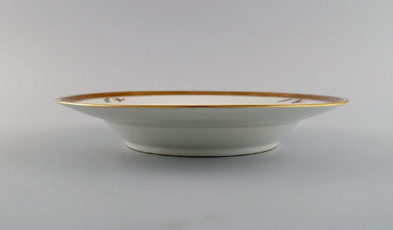 Mid-20th Century Eight Royal Copenhagen Golden Basket Deep Plates in Hand-Painted Porcelain For Sale