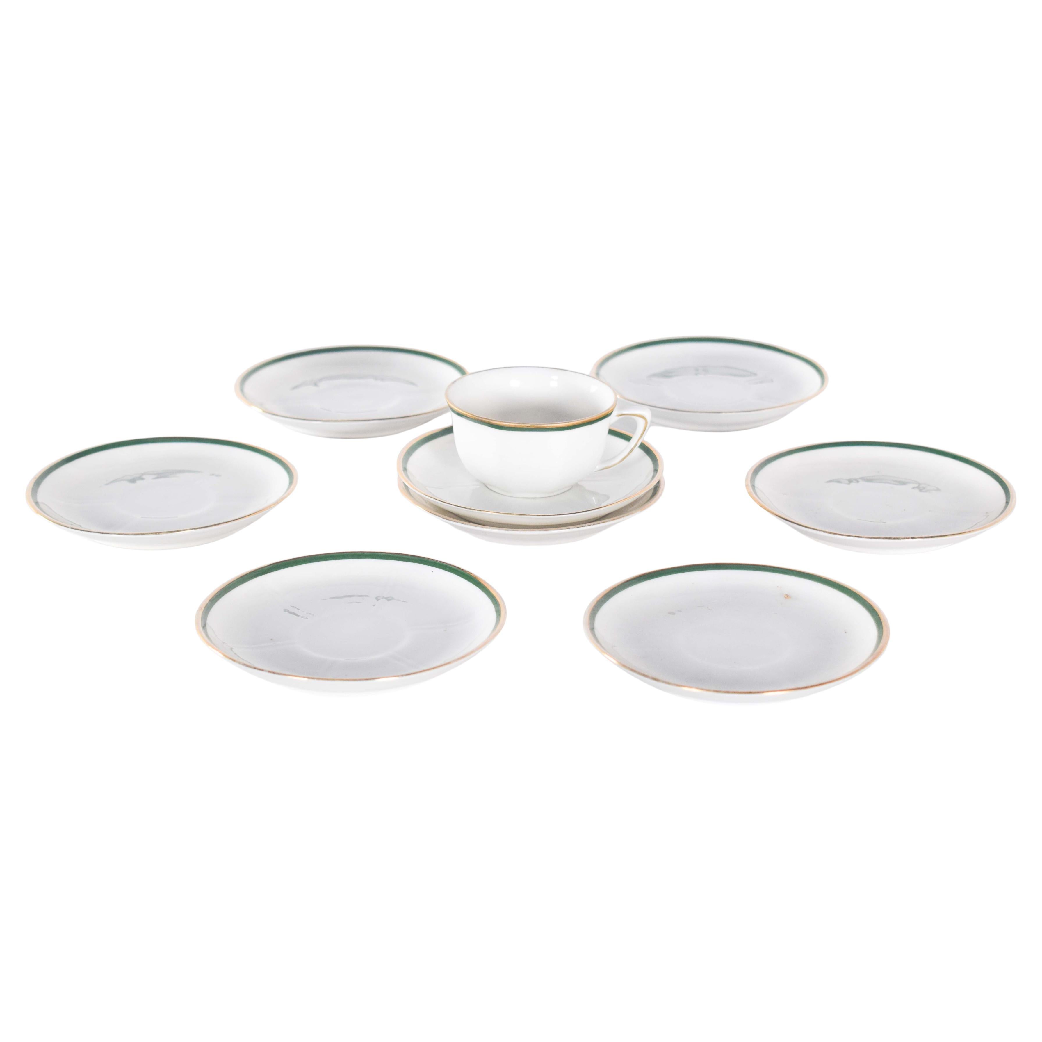 Huit soucoupes et une tasse en porcelaine de Vista Alegre, Portugal