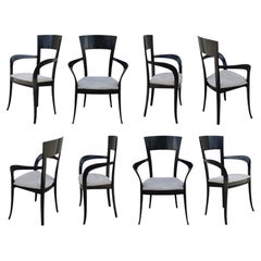 Ocho esculturales sillas de comedor lacadas en negro de Pietro Costantini, Made in Italy