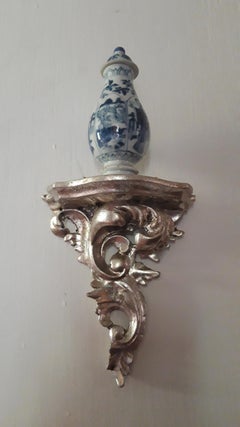 Eight Silvered Wooden Wall Brackets