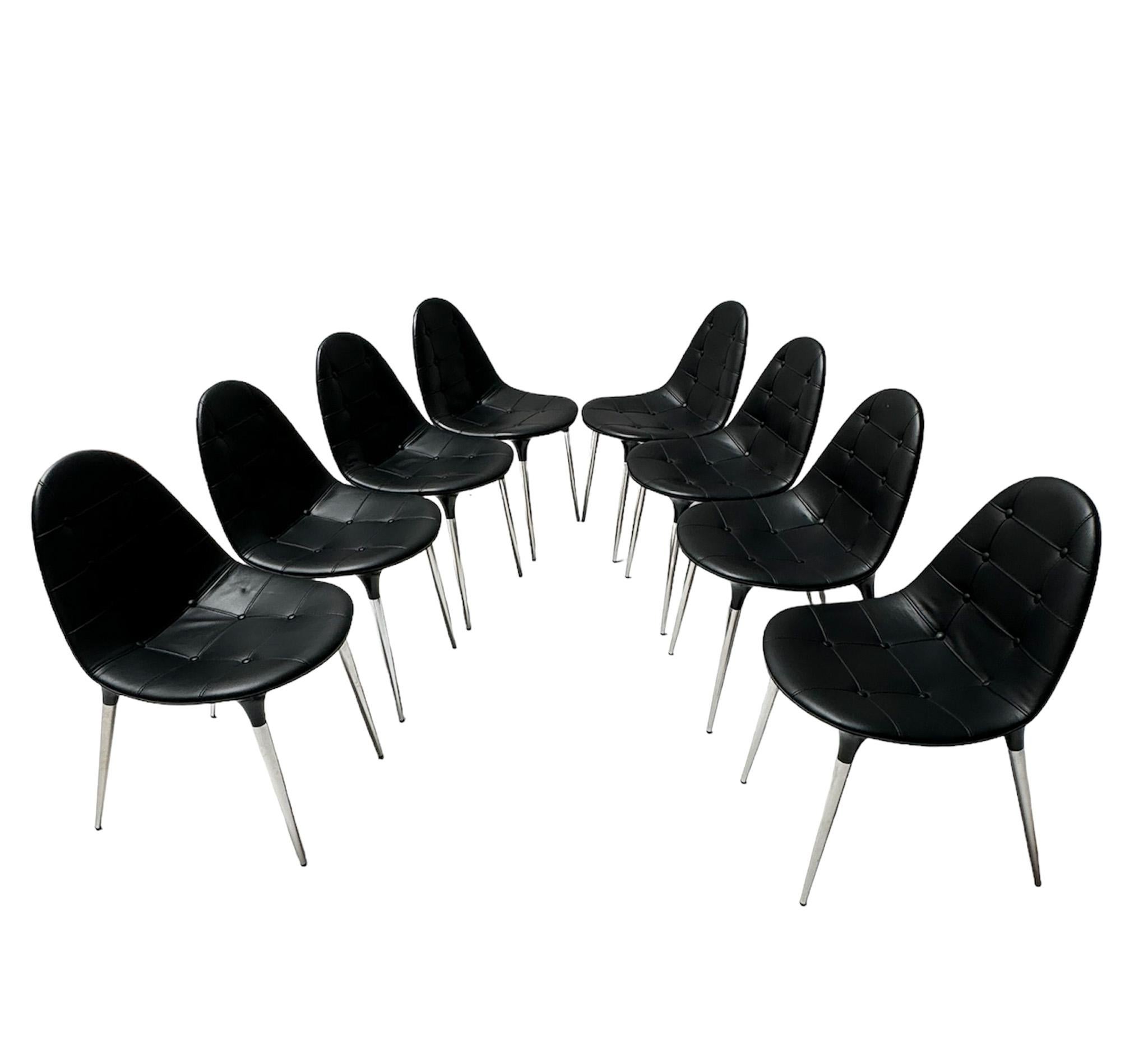 Magnificent and rare set of eight Space Age Style dining room chairs.
Design by Philippe Starck for Cassina.
Striking Italian design from 2007.
Chrome plated steel legs with black nylon shell backs and black quilted leather upholstery.
This model is