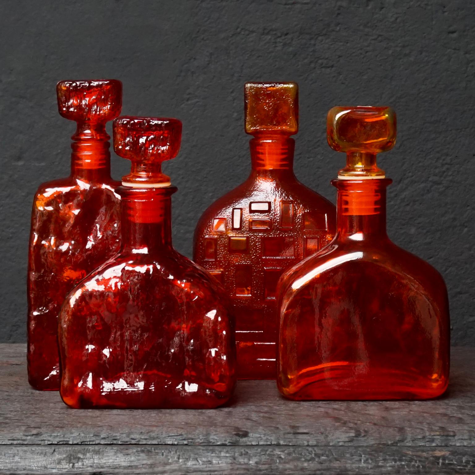 Mid-20th Century Eight Tangerine Amberina 60s Italian Empoli Rossini Glass Decanters Blenko Style