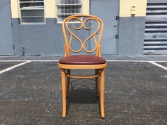 Eight Thonet Dining Chairs