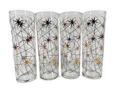 Eight Vintage Atomic Tom Collins Glasses with Gold Stars and Black Enamel Lines