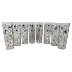 Eight Vintage Atomic Tom Collins Glasses with Gold Stars and Black Enamel Lines
