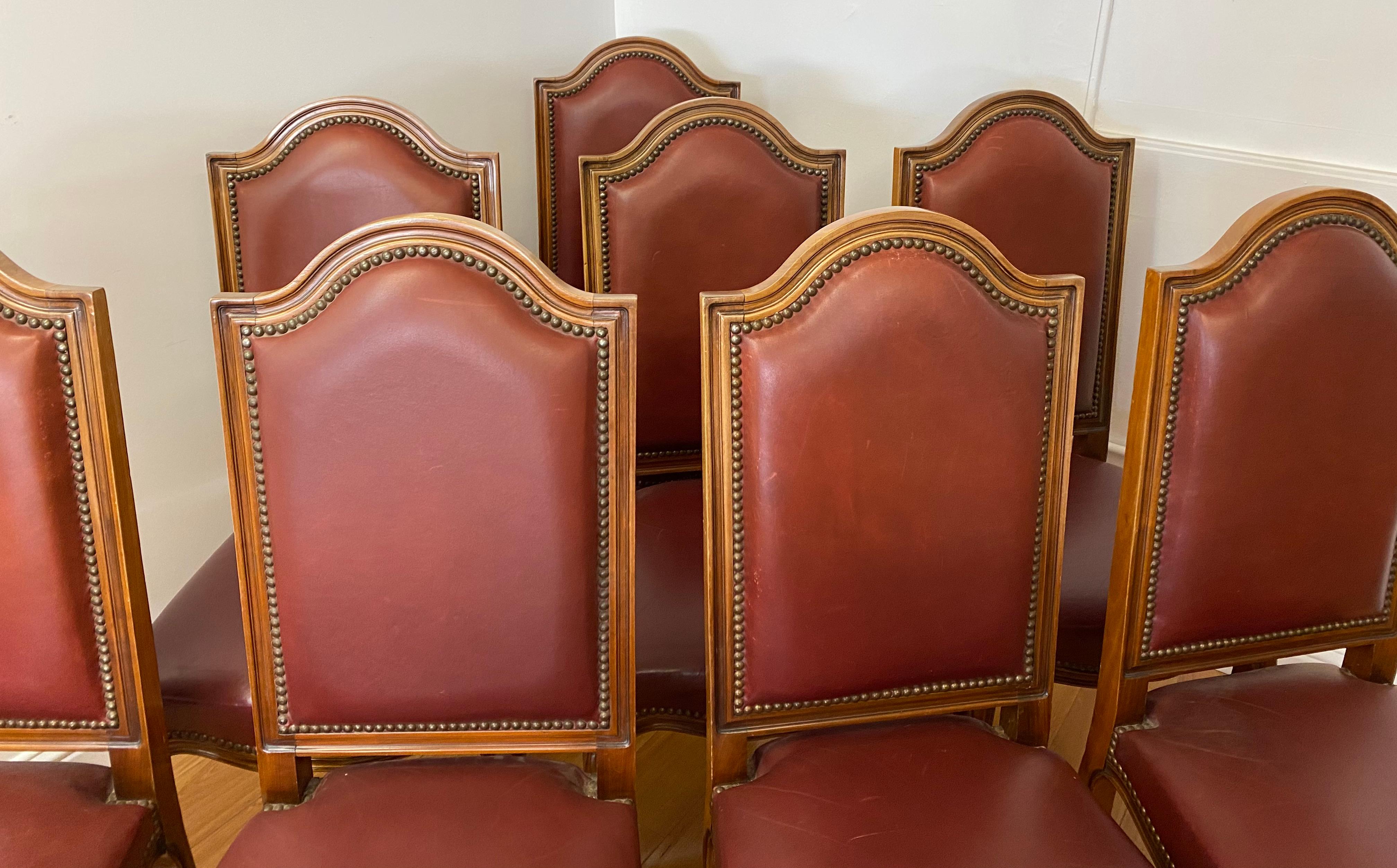 Eight vintage carved & leather upholstered high back dining chairs

Gorgeous set of dining chairs

The chairs are solid, sturdy and comfortable

Brass tacks surround the leather upholstery

Good vintage condition 

Measures: 20