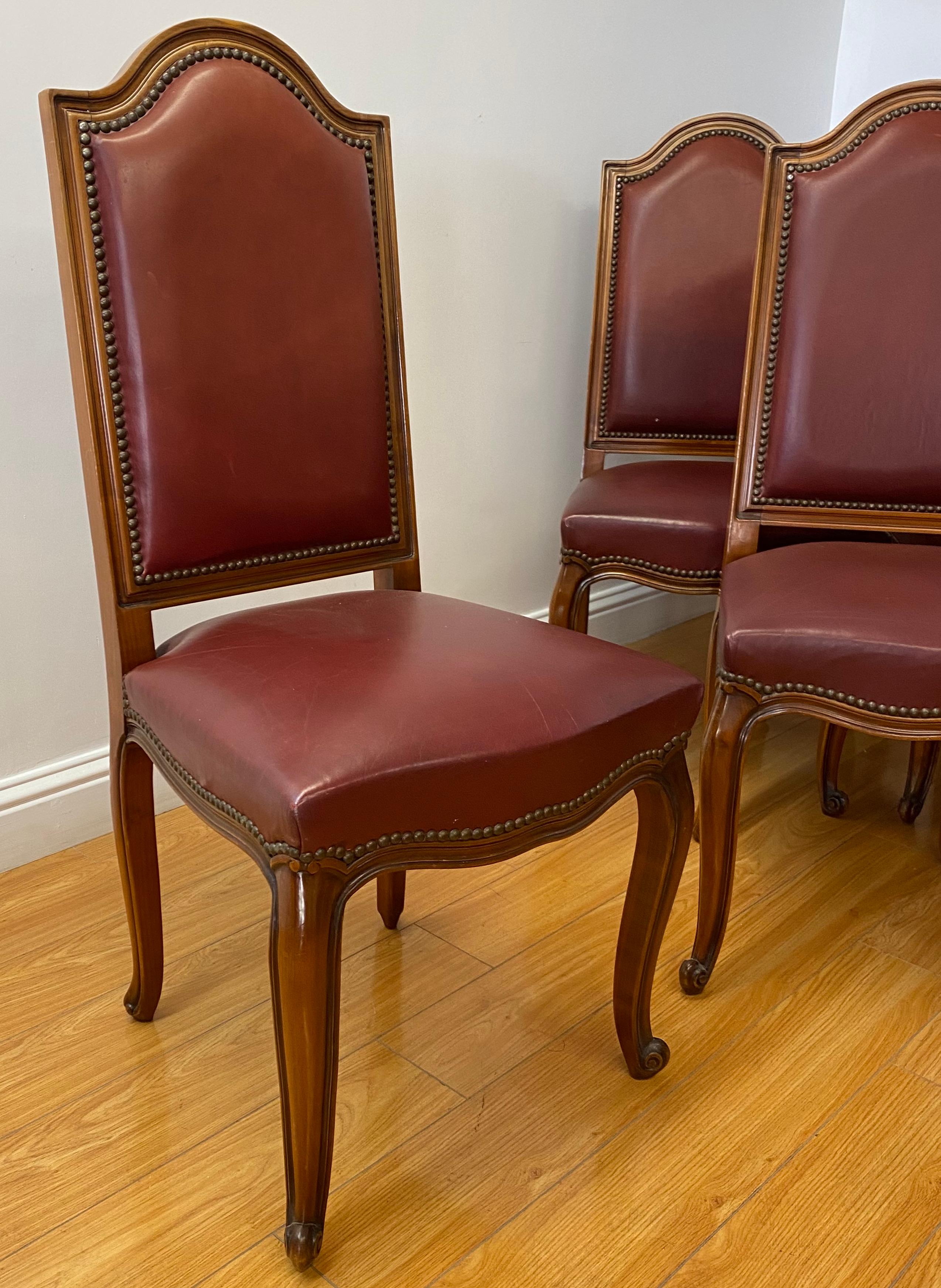 Eight Vintage Carved & Leather Upholstered High Back Dining Chairs In Good Condition In San Francisco, CA