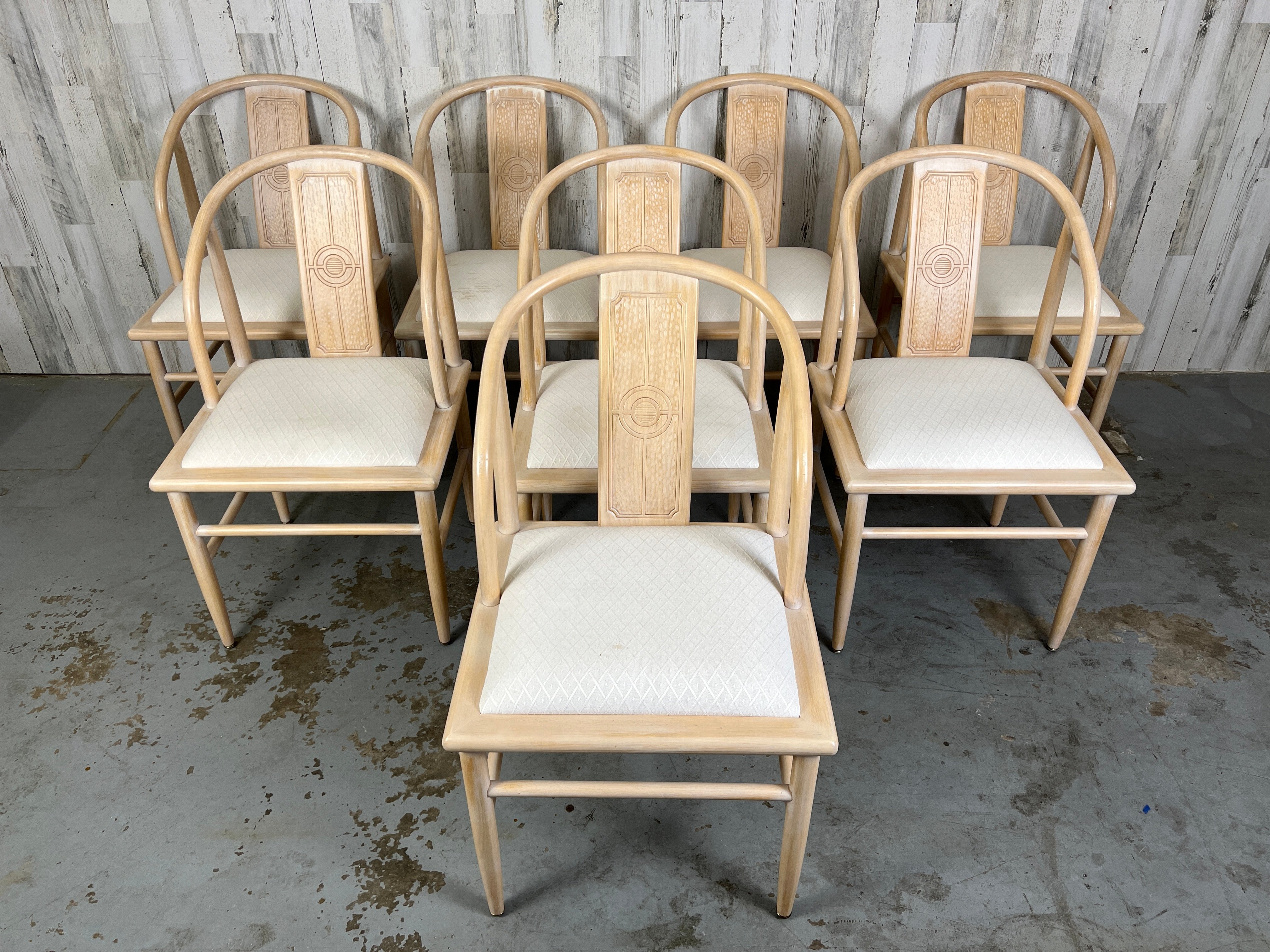 Asian modern horseshoe style dining chairs with an almond cerused finish.
Very comfortable and sturdy. New upholstery is required please see pictures.
 
