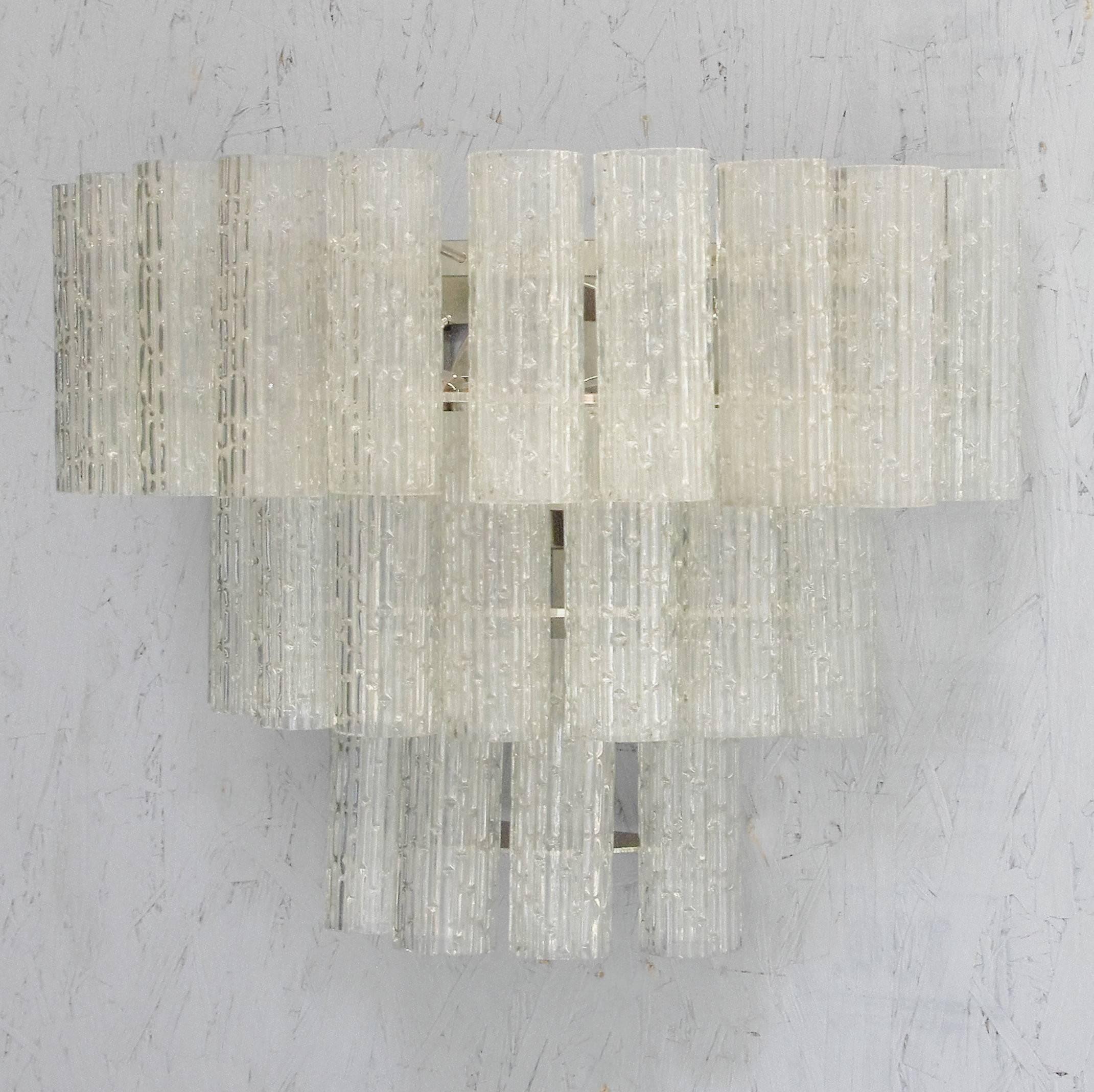 Set of Eight Vintage Italian sconces with clear Murano textured glass tubes mounted on chrome hardware / designed by Mazzega, circa 1960s, made in Italy.