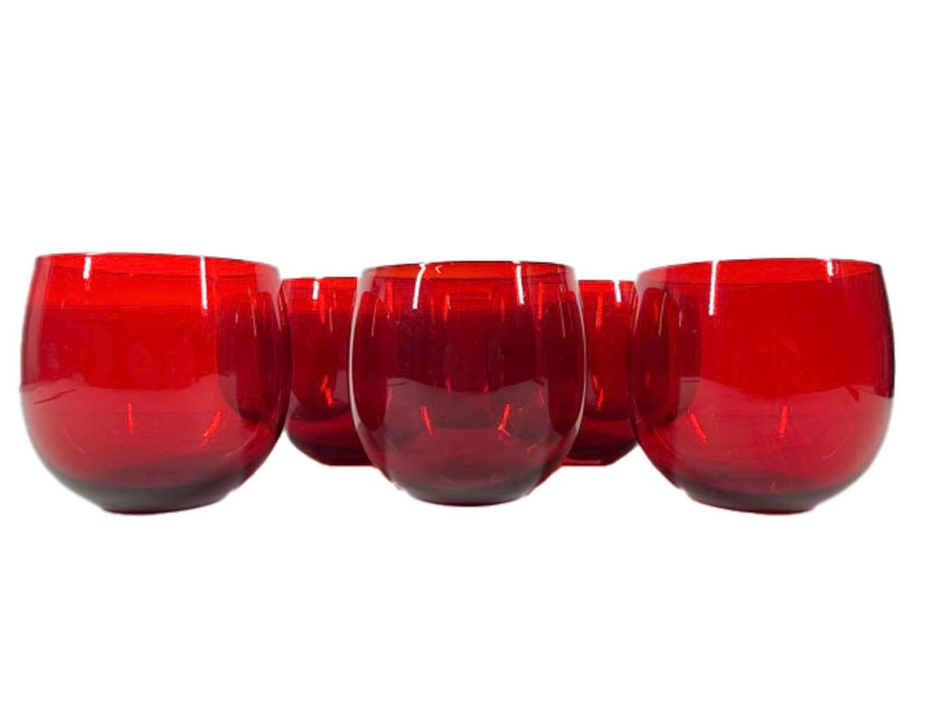 Eight mid-twentieth century large size, roly poly cocktail glasses in red glass.