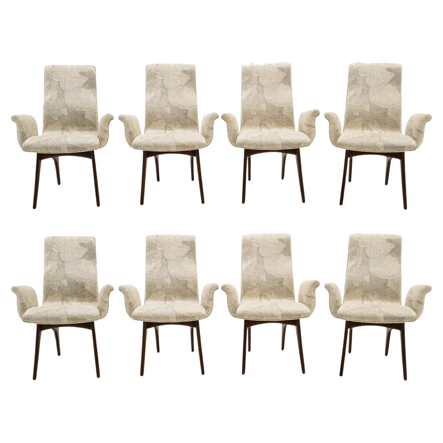 Eight Vladimir Kagan Dining Chairs with Arms.  Excellent Condition.