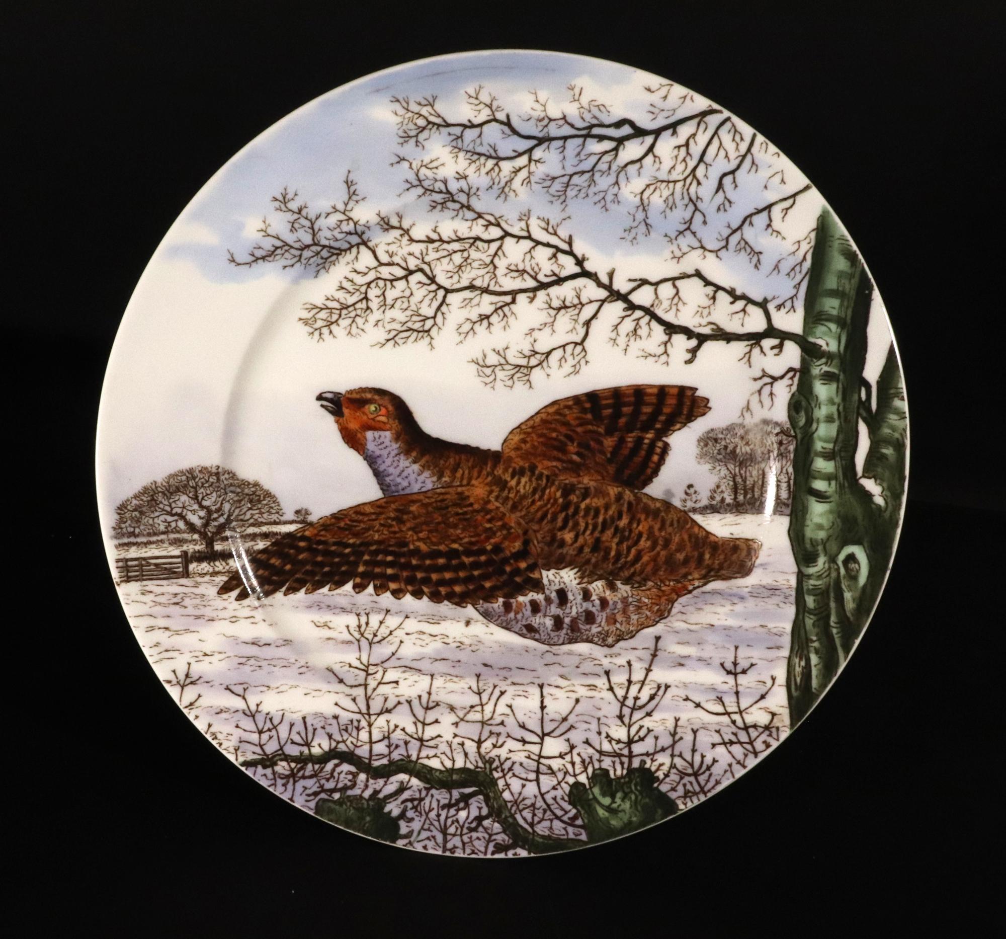 British Porcelain Set of Eighteen decorated with Game Birds,
Designed by Edward Kennard,
Made by Brownfield Westhead Moore and Co.,
Retailed by John Mortlock,
Circa 1870-80


The large circular plates each depict a game bird in flight within a scene