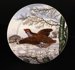 Diciotto piatti da caccia inglesi in porcellana, disegnati da Edward Kennard