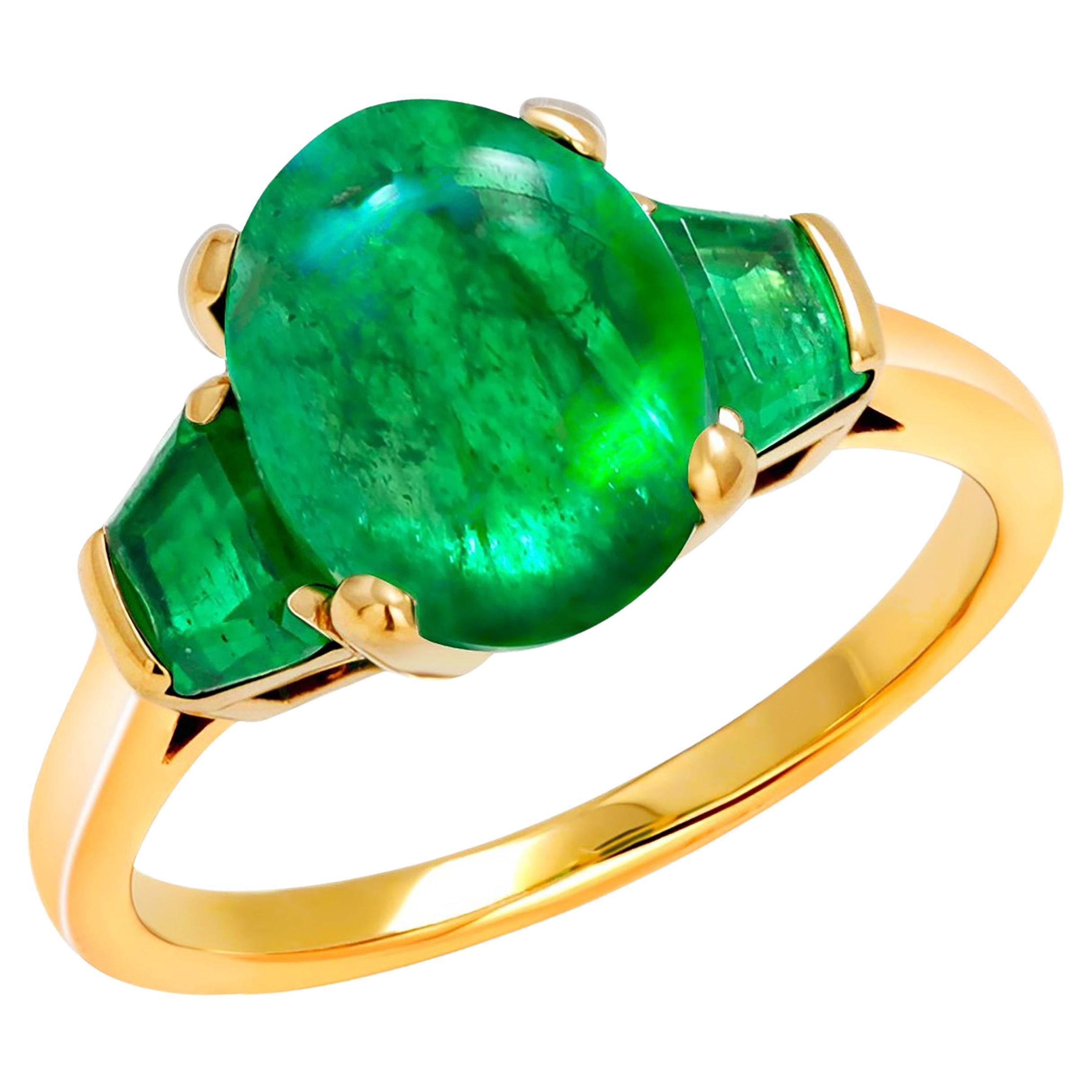 Eighteen Karat Gold Cabochon Emerald and Trapezoid Shaped Emerald Cocktail Ring