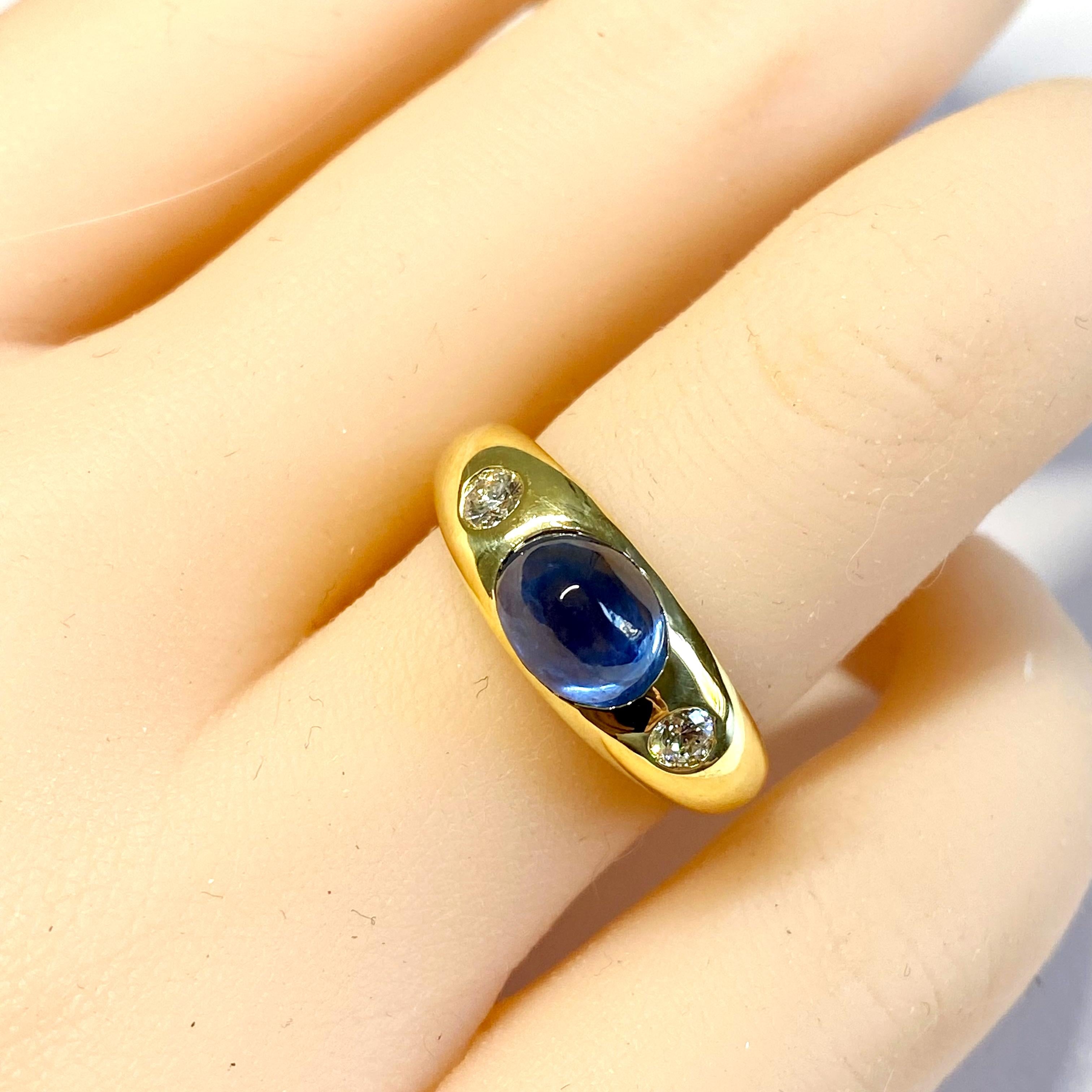 Women's Eighteen Karat Gold Ceylon Cabochon Sapphire Two Diamonds 3 Stone Ring For Sale