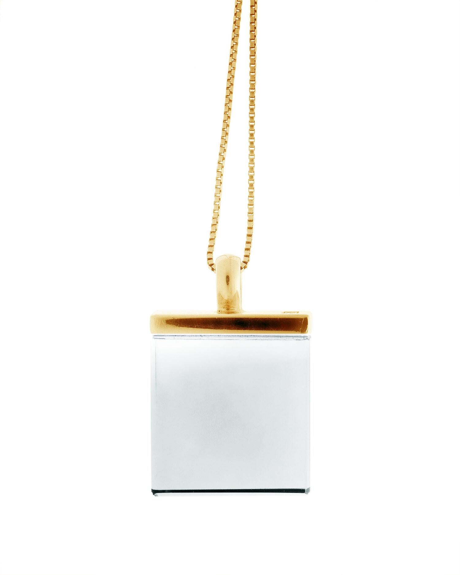 This designer pendant necklace in Art Deco style features a 15x15x8 mm transparent tear-clean quartz and is made of 18-karat rose gold. It belongs to the Ink collection, which has been featured in both Harper's Bazaar and Vogue UA.

The pendant's