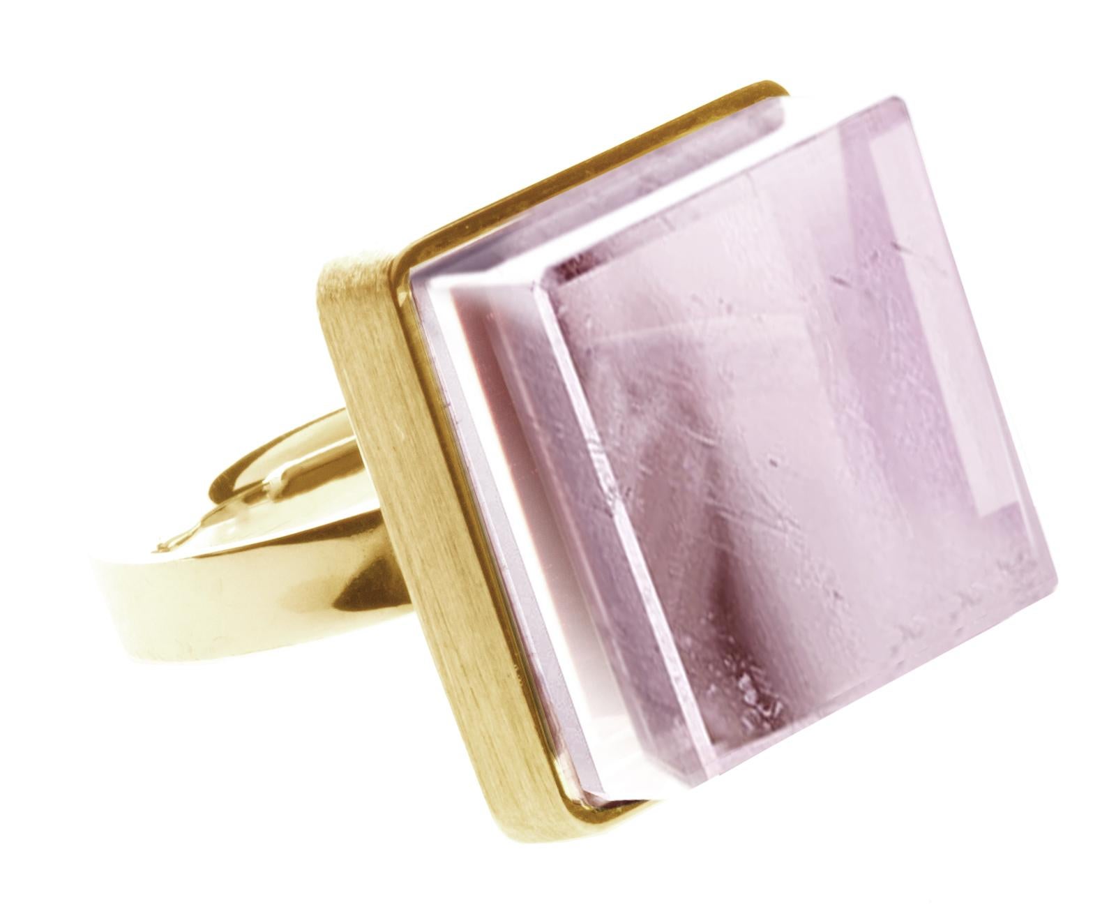 This Art Deco-inspired ring is made of 18 karat rose gold and features a natural rose quartz measuring 15x15x8 mm. The ring has been featured in Harper's Bazaar and Vogue UA.

Its design is sure to inspire architects, designers, and artists. The gem