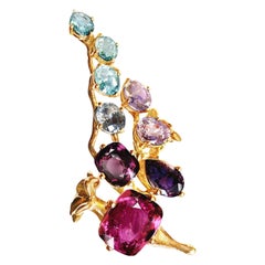 Colgante de gemas de oro rosa de dieciocho quilates y catorce quilates con zafiros rosas