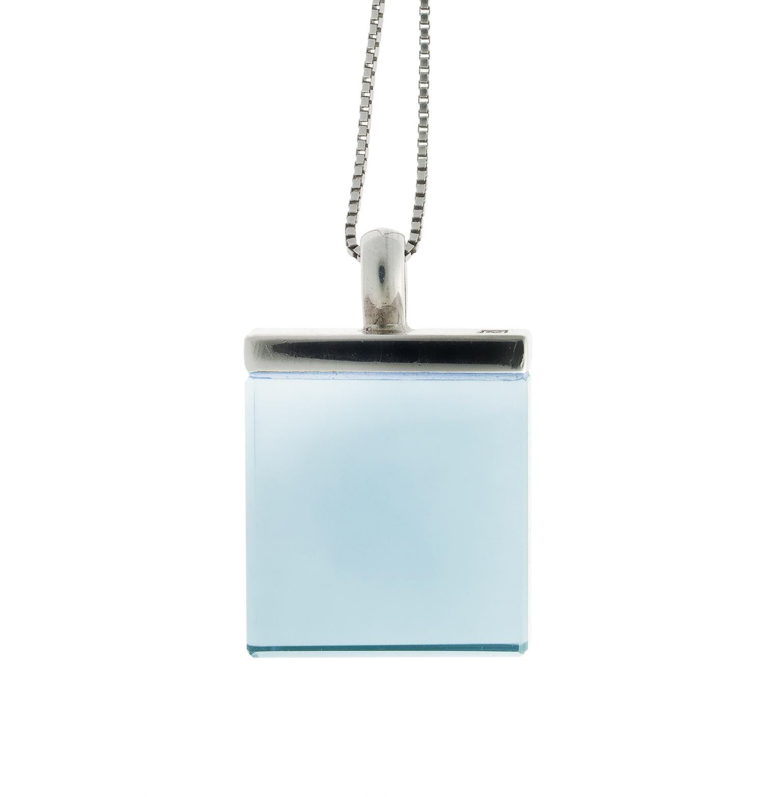 This designer pendant necklace in Art Deco style features a 15x15x8 mm blue quartz and is made of 18-karat white gold. It belongs to the Ink collection, which has been featured in both Harper's Bazaar and Vogue UA.

The pendant's sky-blue quartz