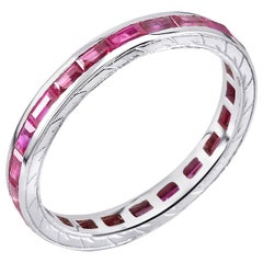 Eighteen Karat White Gold Baguette Ruby Eternity Engraved Band