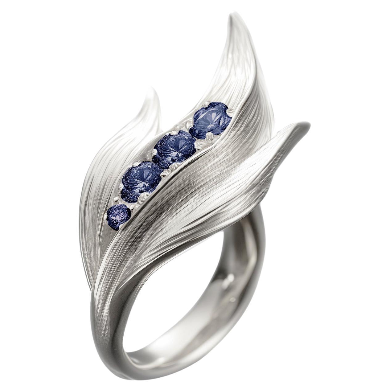 Eighteen Karat White Gold Contemporary Engagement Ring with Sapphires For Sale