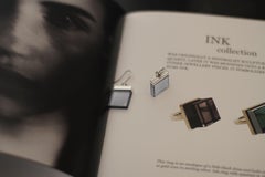 Eighteen Karat White Gold Earrings by Artist with Blue Topazes