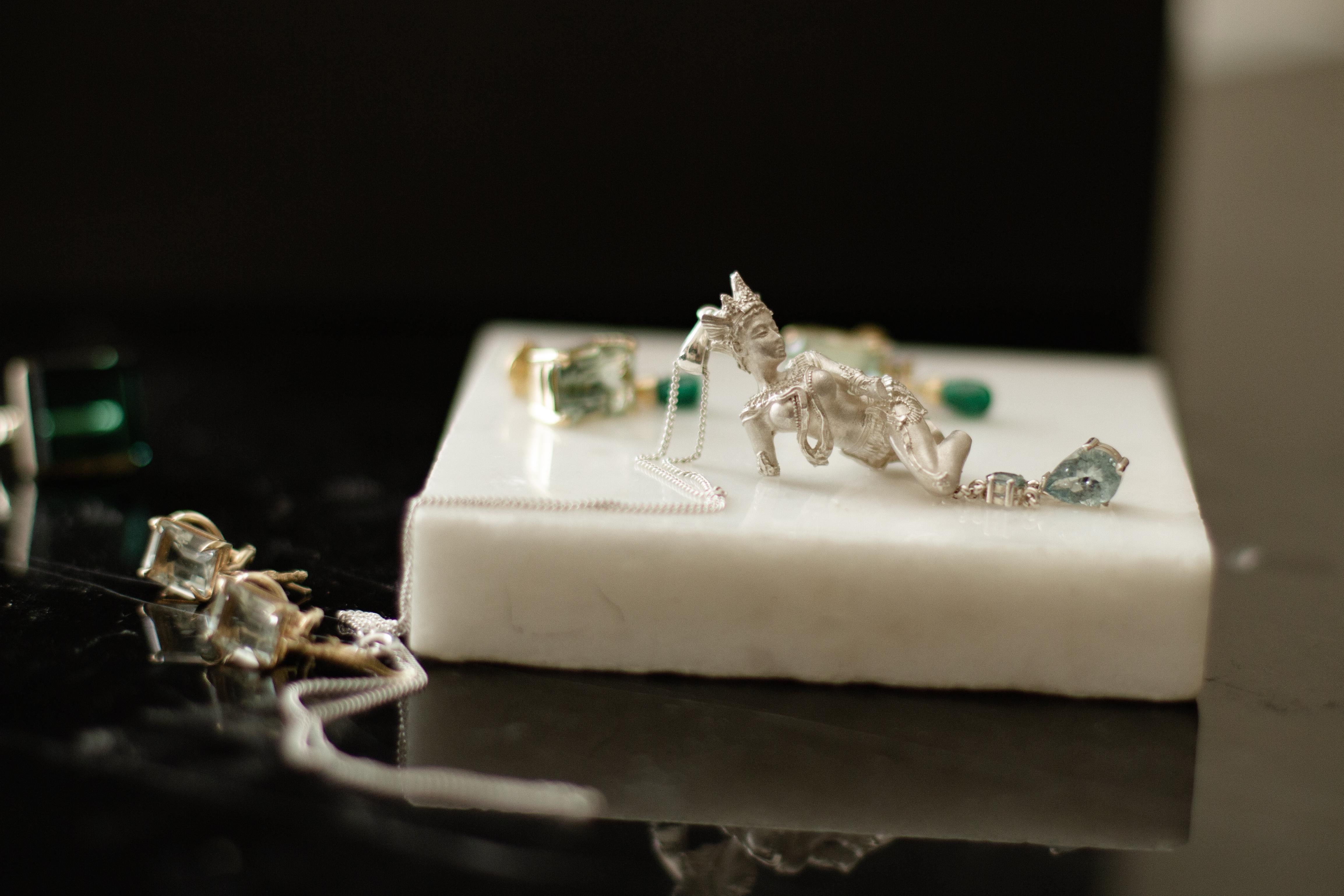 Oval Cut Eighteen Karat White Gold Sculpture Pendant Necklace with Paraiba Tourmaline For Sale