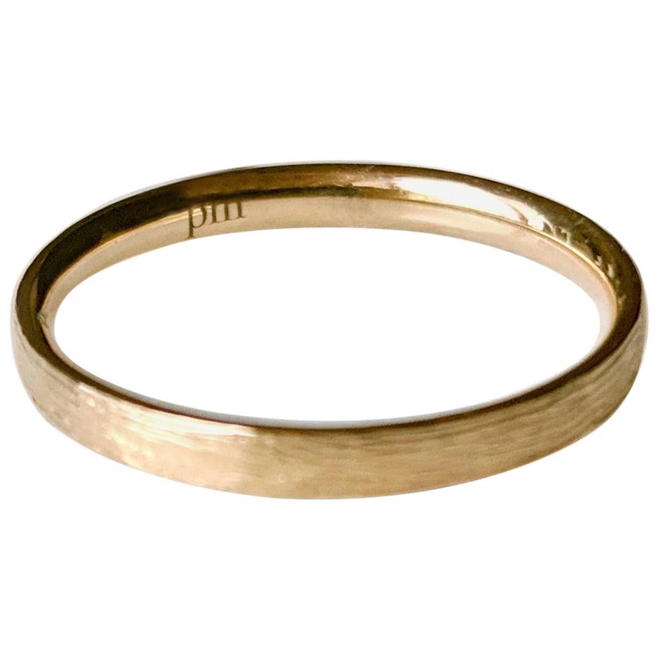 These 18 karat yellow gold ring has shining brocade texture of the gold. 
The ring can be ordered as usual fashion ring, also as a phalange ring in smaller size. The size and the colour of the gold can be changed.