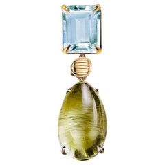 Broche de gota de oro amarillo de dieciocho quilates con cabujón de peridoto y topacio
