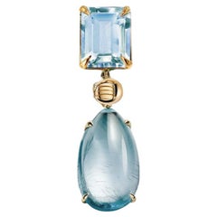 Broche de gota de oro amarillo de dieciocho quilates con topacio y berilo azul