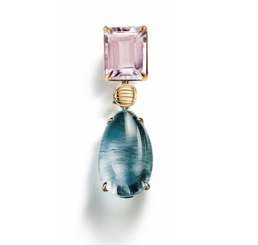 This Contemporary Pendant Necklace is made of 18 karat yellow gold with cabochon beryl and rose quartz. It has a crocodile detail on the side of one gem.
We work with german gems company, that is in the market since the 19th century.

The piece can