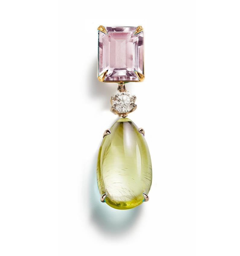 This Contemporary Pendant Necklace is made of 18 karat yellow gold with cabochon peridot, round sapphire and rose quartz. It has a crocodile detail on the side of the cabochon gem.
We work with german gems company, that is in the market since the