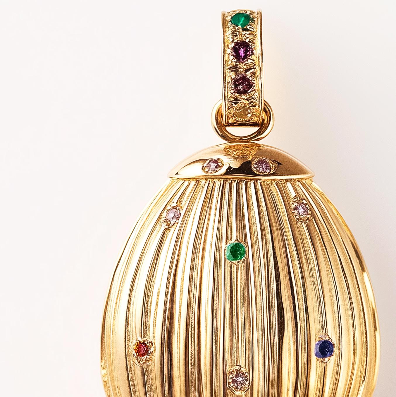 These contemporary Easter earrings are crafted from 18-karat yellow gold and feature round-cut sapphires and emeralds. We source our gemstones from a renowned German company that has been in the market since the 19th century.

If you are choosing a