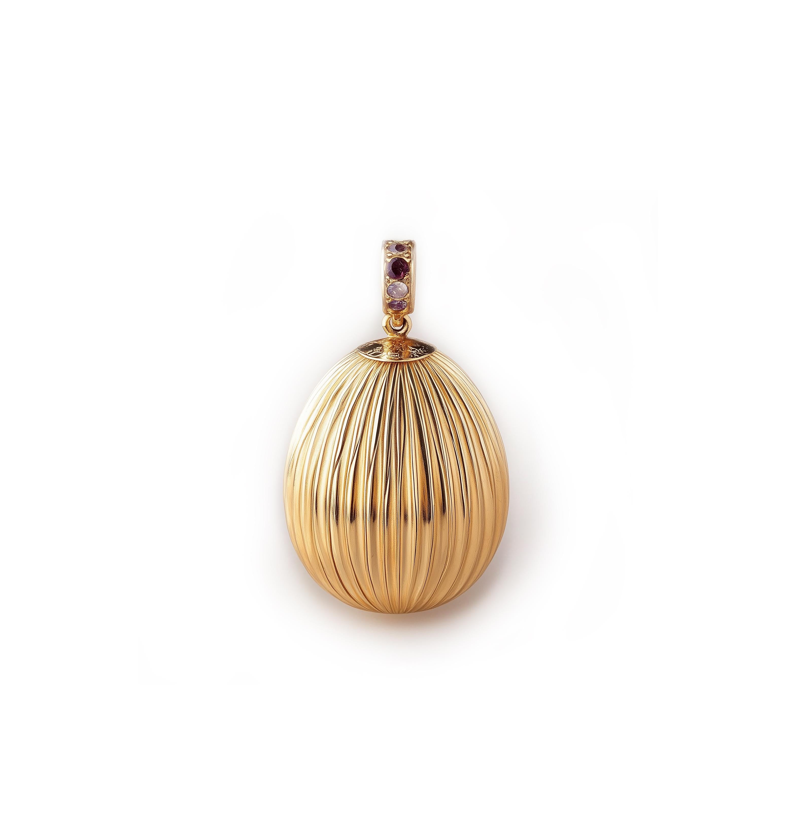 Round Cut Eighteen Karat Yellow Gold Easter Pendant with Purple Sapphires For Sale